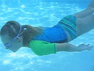 Robin Swimming in the Hotel Pool